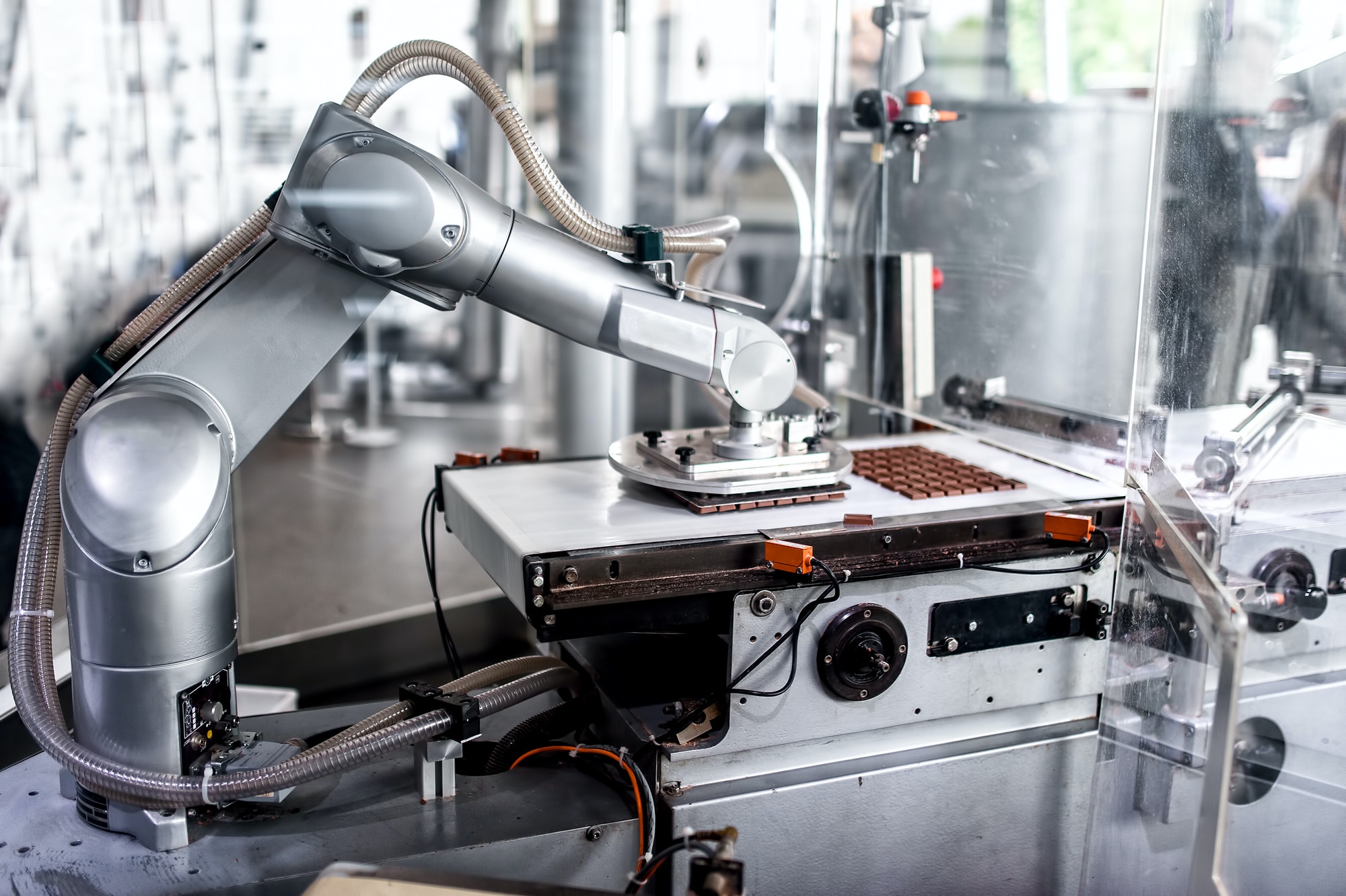 Automatic Robotic Hand moving and preparing tiny bits of chocolate
